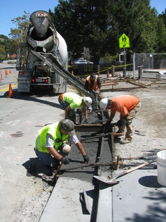 Contractor W.R. Forde staff laying the concrete